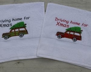 Gastendoekjes wit met auto met kerstboom en tekst Driving home for Christmas