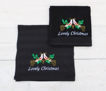 Zwarte kerst keukenhanddoek en theedoek met duiven en de tekst Lovely Christmas